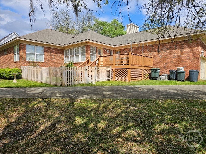 Brick home with tidal creek wrapping around back and side of - photo 4