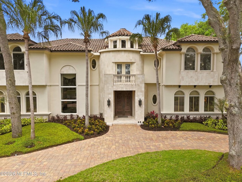 Experience exceptional waterfront living in this Mediterranean - photo 3