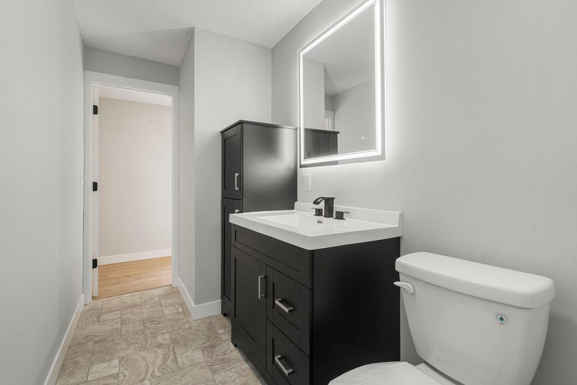 A fresh approach to one-level living! This zero-entry home sits - photo 11