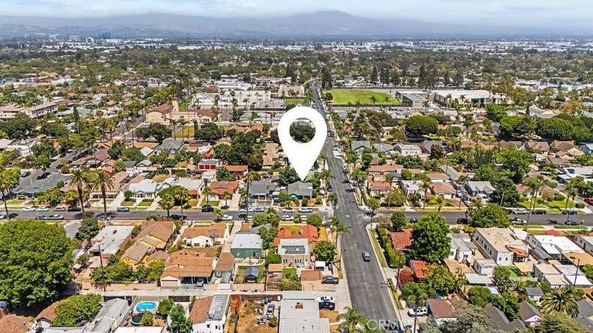Step into the charm of this historic Santa Ana cottage, where - photo 9