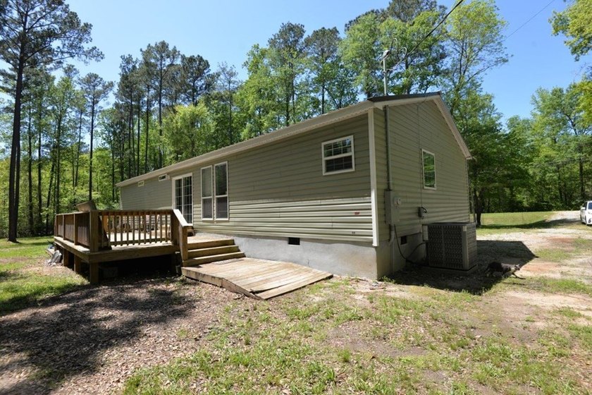 Conveniently located near Lake Sinclair and just minutes from - photo 2