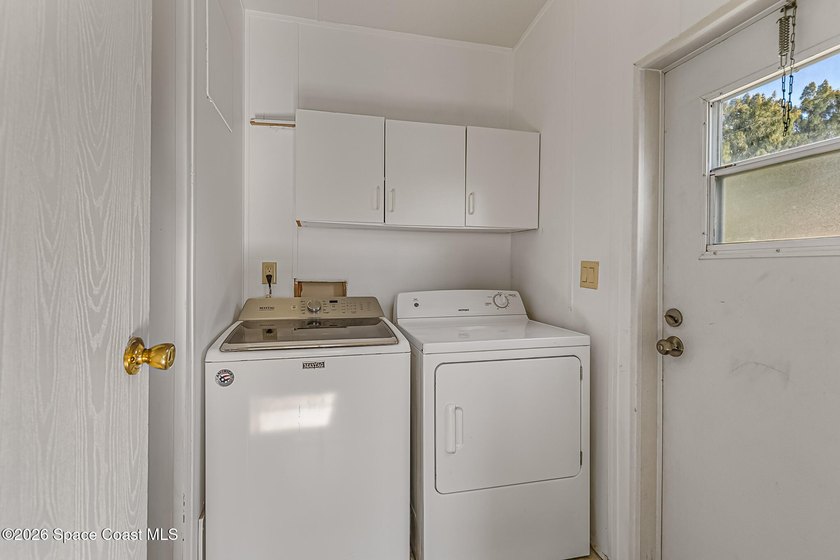 Enjoy this charming 3-bed, 2-bath home in Palm Bay Estates, a - photo 13
