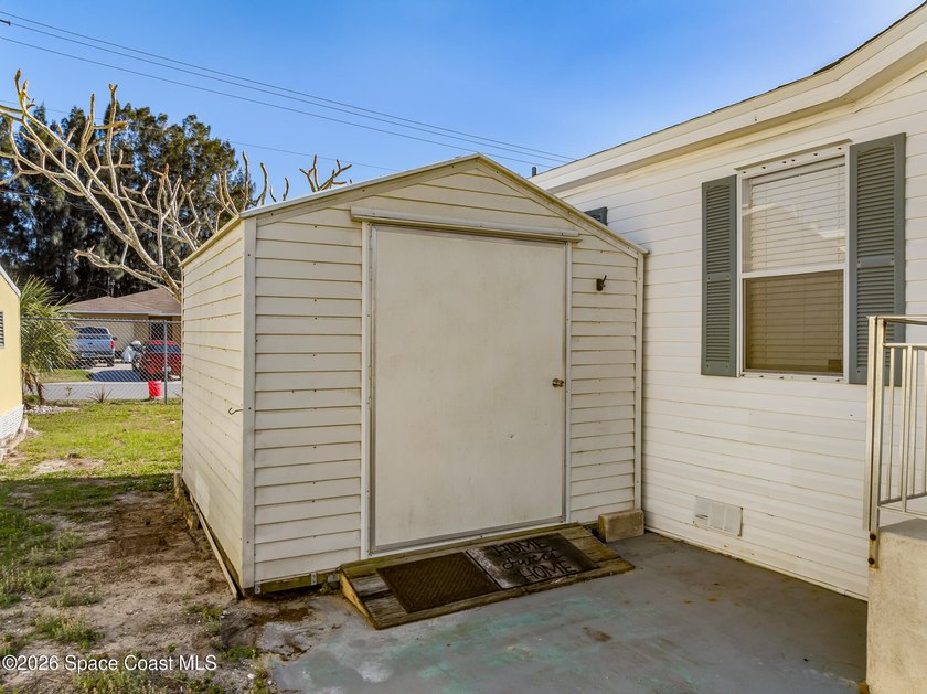Enjoy this charming 3-bed, 2-bath home in Palm Bay Estates, a - photo 32