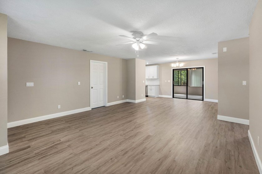 Welcome home to this updated 3-bedroom, 2-bath single-family - photo 3