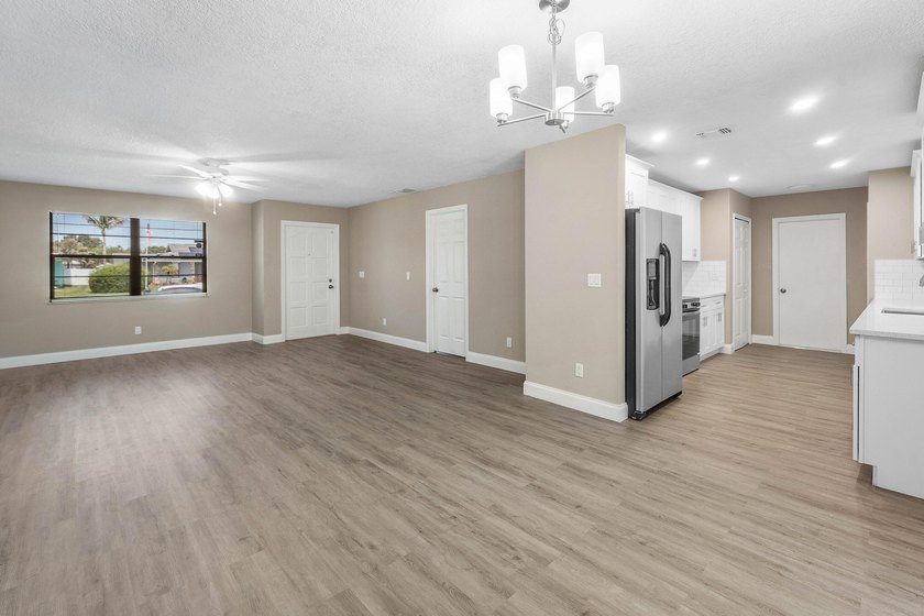 Welcome home to this updated 3-bedroom, 2-bath single-family - photo 4