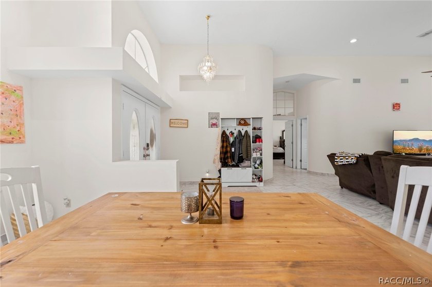 Welcome to this former model home tucked away on a private - photo 5