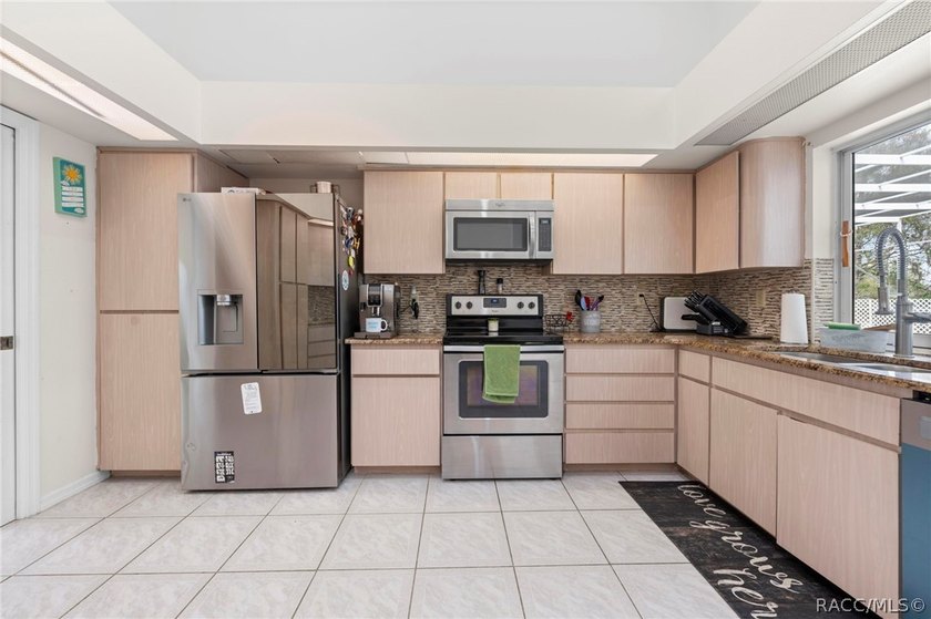 Welcome to this former model home tucked away on a private - photo 8