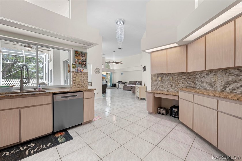 Welcome to this former model home tucked away on a private - photo 10