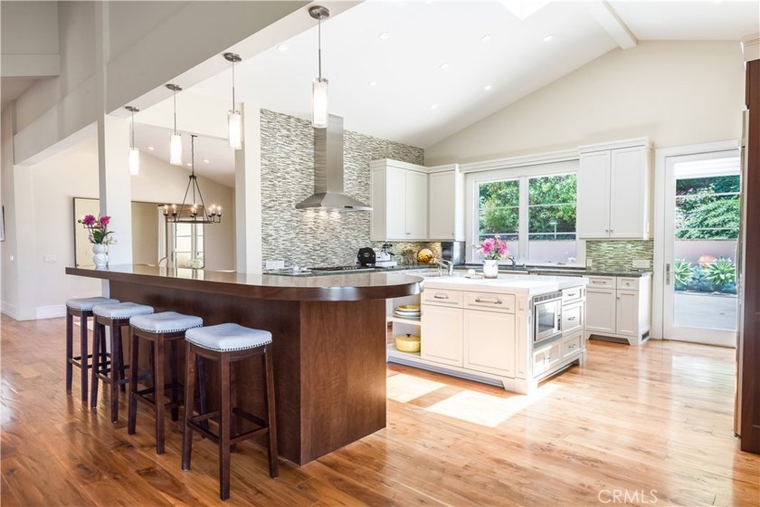 Reimagined and rebuilt in 2012, this warm contemporary is - photo 3