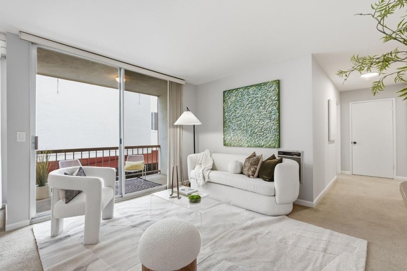 Welcome to 250 Whitmore Avenue, Unit 104, a bright and - photo 2