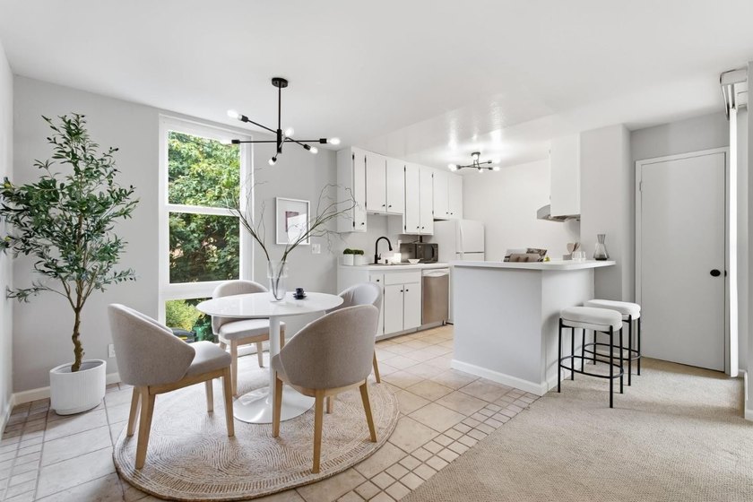 Welcome to 250 Whitmore Avenue, Unit 104, a bright and - photo 4