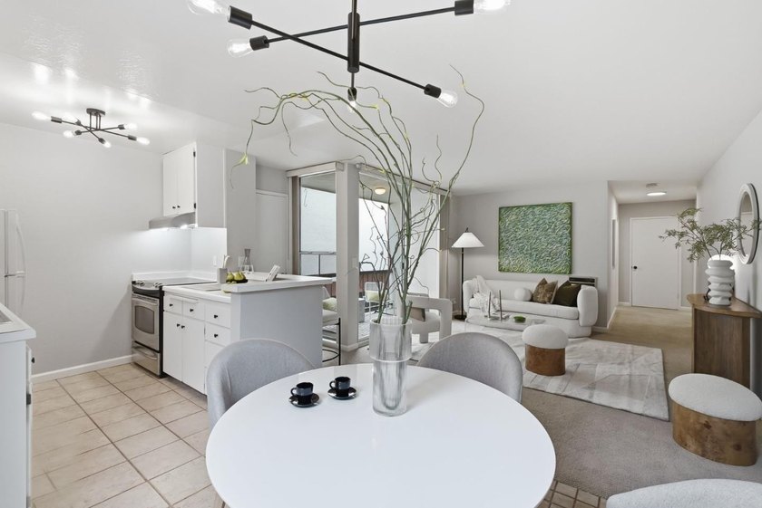Welcome to 250 Whitmore Avenue, Unit 104, a bright and - photo 9