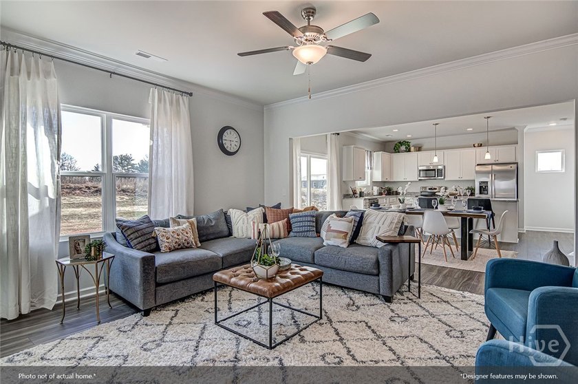 The Russell is a versatile two-story home featuring four - photo 10