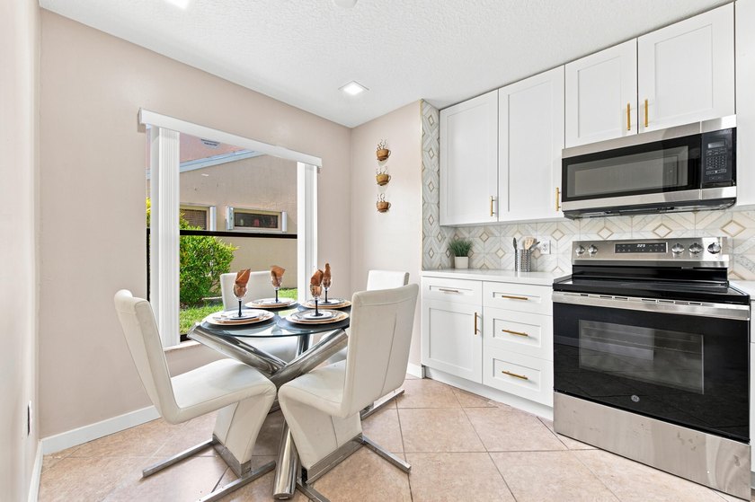 THIS STUNNING WATERFRONT CORNER HOME IN LAKESIDE GREEN IS THE - photo 9