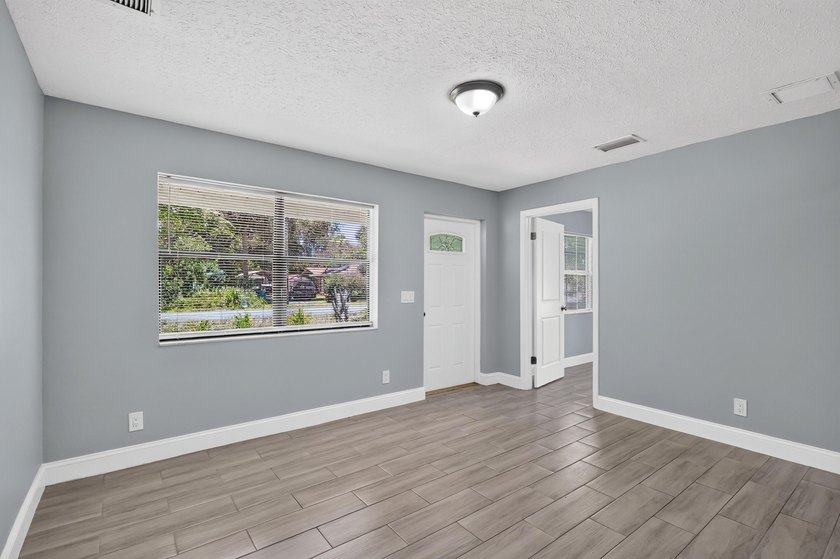 Nicely renovated 3-bedroom, 2-bath CBS home situated on a - photo 10