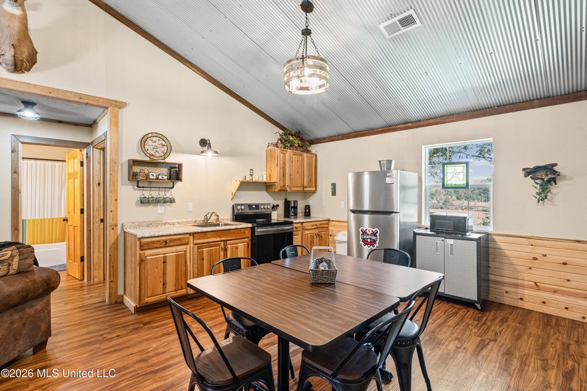 Rare opportunity to own a fully furnished duplex on - photo 5