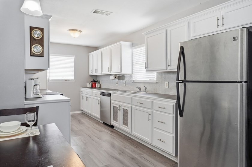 Nestled on two spacious lots in Holiday Beach, this fully - photo 12