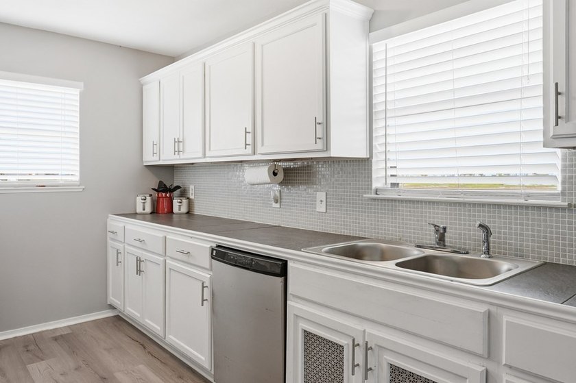 Nestled on two spacious lots in Holiday Beach, this fully - photo 14