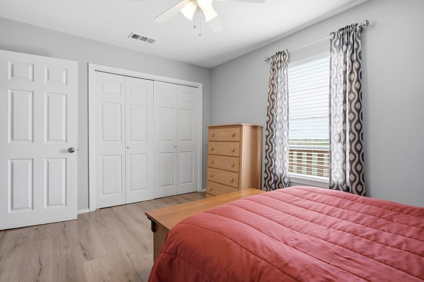 Nestled on two spacious lots in Holiday Beach, this fully - photo 16