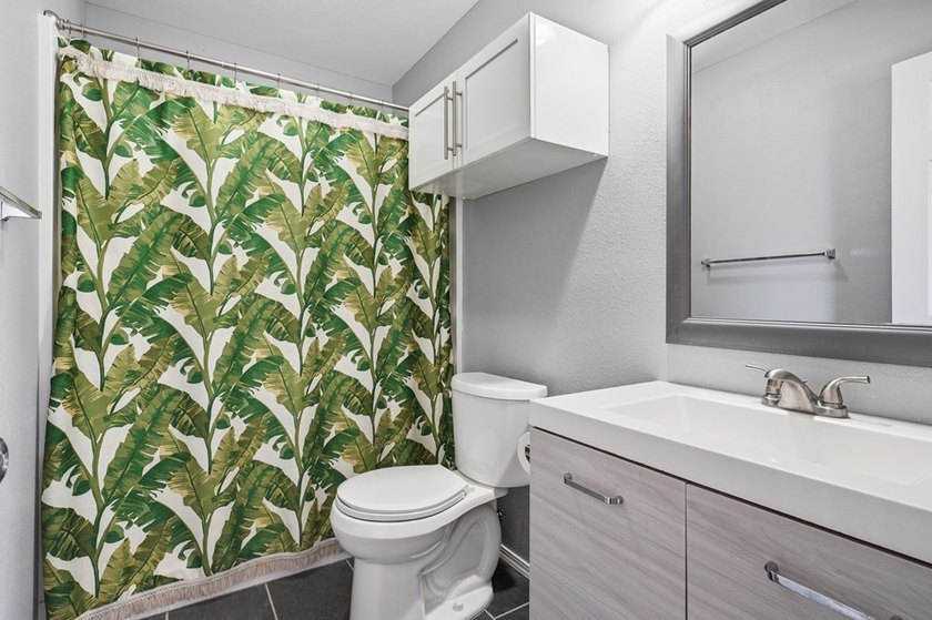 Nestled on two spacious lots in Holiday Beach, this fully - photo 17
