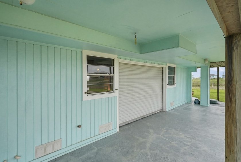 Nestled on two spacious lots in Holiday Beach, this fully - photo 23