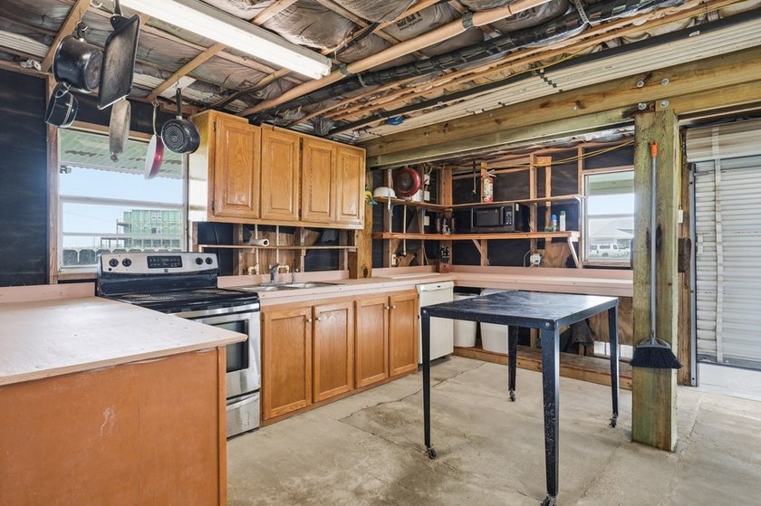 Nestled on two spacious lots in Holiday Beach, this fully - photo 29