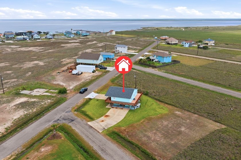 Nestled on two spacious lots in Holiday Beach, this fully - photo 32