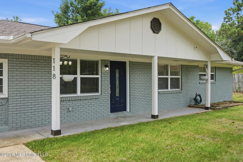 Beautifully updated 4-bedroom, 2-bath brick home with a - photo 41