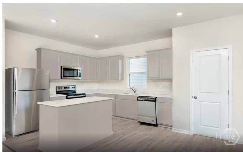 The Dunlin floorplan features an open, easy-living layout in a - photo 2