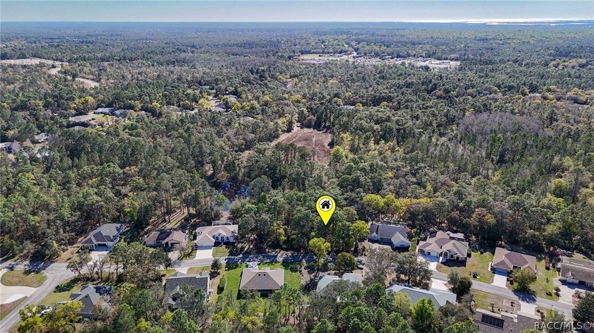 Build your dream home on this beautiful vacant lot in Sugar Mill - photo 6