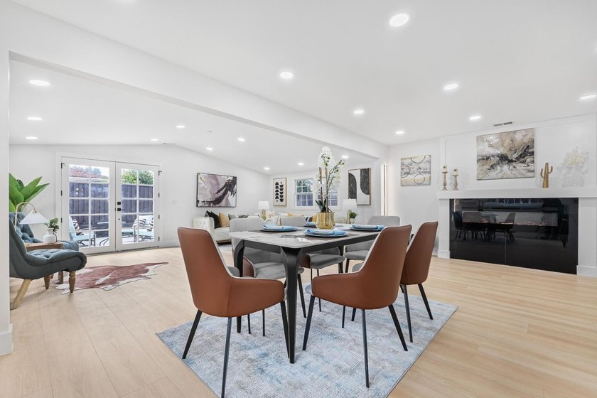 Welcome to this charming 4-bedroom, 2-bathroom home located in - photo 2