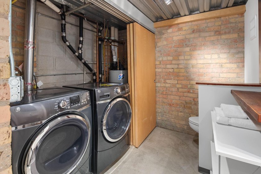 Located in the historic 801 lofts, this authentic loft offers a - photo 14