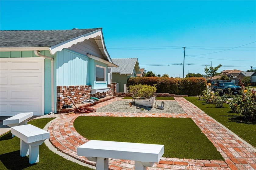 **Welcome Home!** This charming 1960s storybook ranch offers the - photo 15