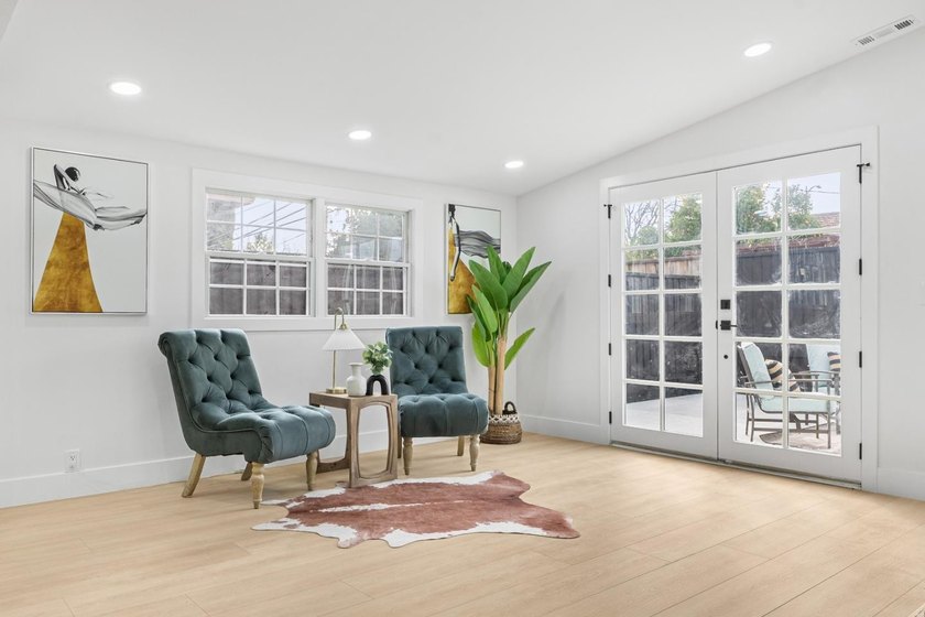 Welcome to this charming 4-bedroom, 2-bathroom home located in - photo 6