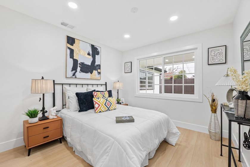 Welcome to this charming 4-bedroom, 2-bathroom home located in - photo 9