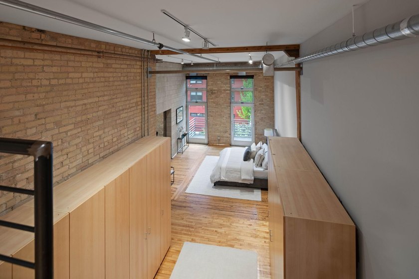 Located in the historic 801 lofts, this authentic loft offers a - photo 23