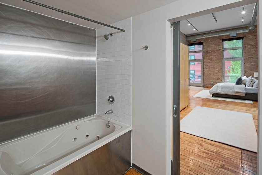 Located in the historic 801 lofts, this authentic loft offers a - photo 25