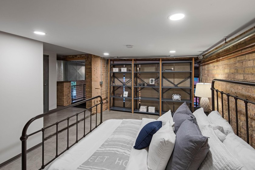 Located in the historic 801 lofts, this authentic loft offers a - photo 29