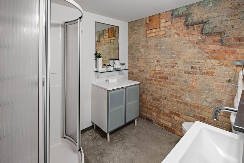 Located in the historic 801 lofts, this authentic loft offers a - photo 30