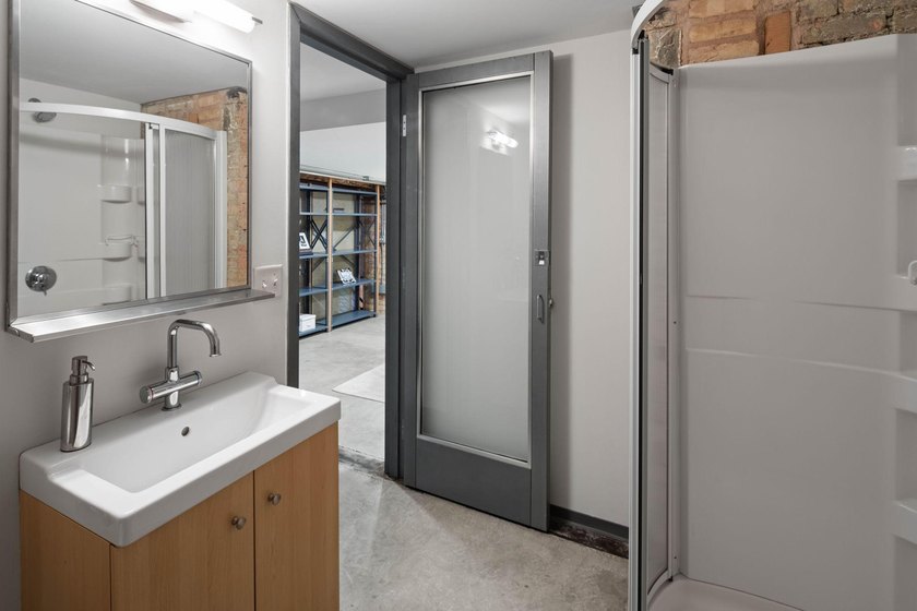 Located in the historic 801 lofts, this authentic loft offers a - photo 31