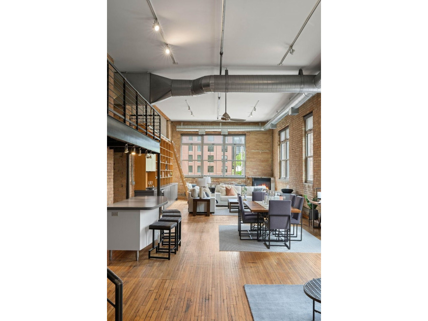 Located in the historic 801 lofts, this authentic loft offers a - photo 32