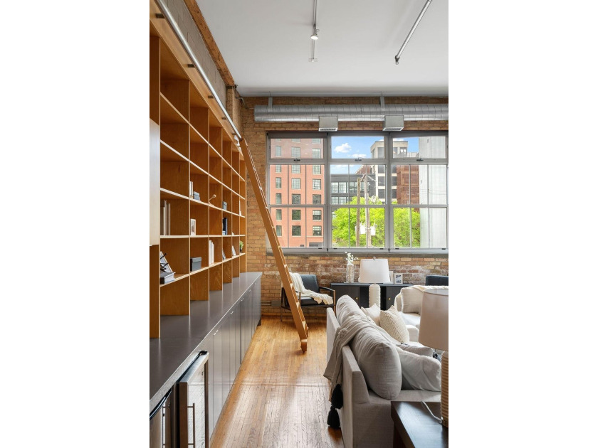 Located in the historic 801 lofts, this authentic loft offers a - photo 33