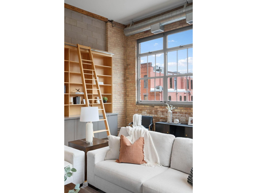 Located in the historic 801 lofts, this authentic loft offers a - photo 34