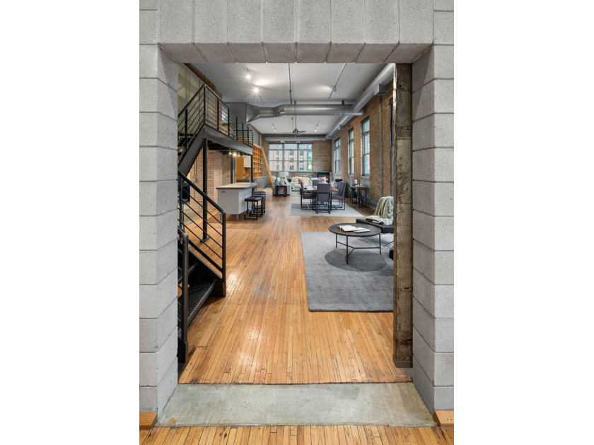 Located in the historic 801 lofts, this authentic loft offers a - photo 35