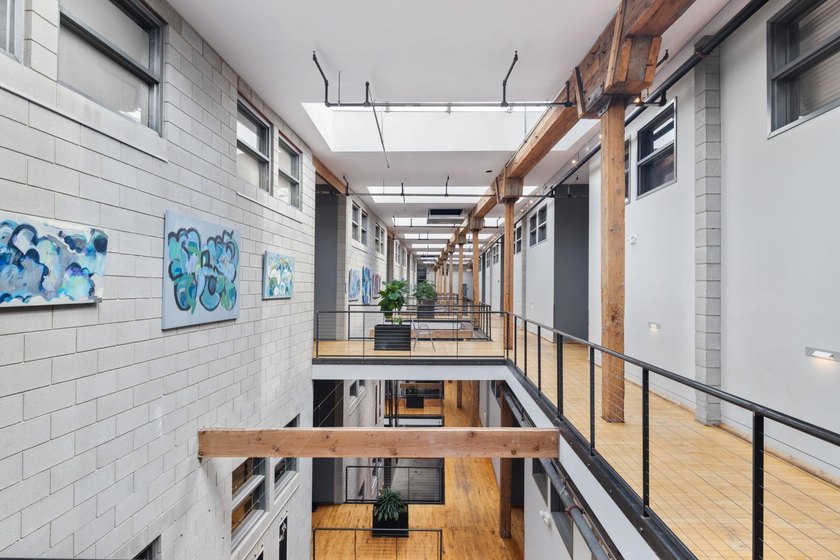 Located in the historic 801 lofts, this authentic loft offers a - photo 42