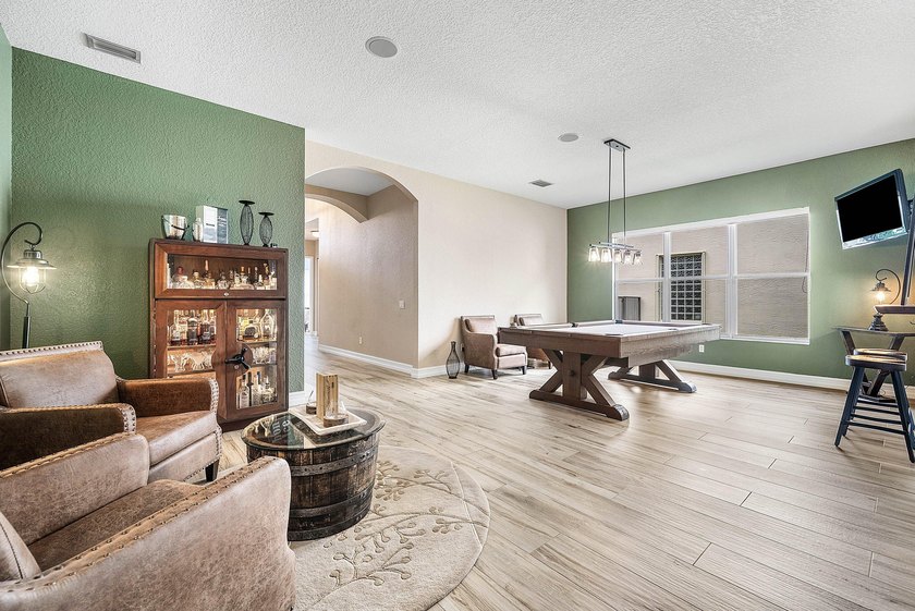 Welcome to this beautifully appointed Onyx model in the highly - photo 6