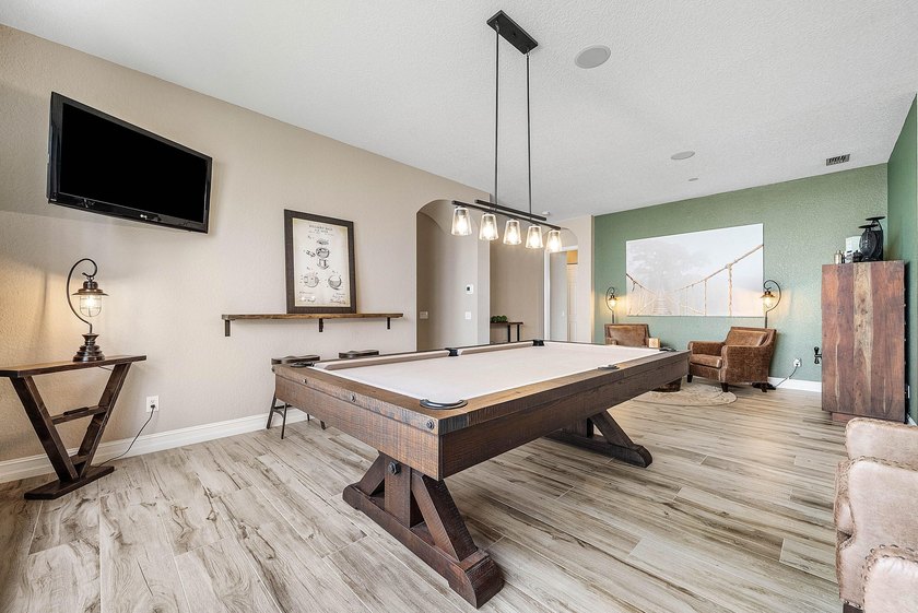 Welcome to this beautifully appointed Onyx model in the highly - photo 9