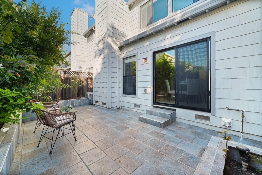 *A private, low-maintenance backyard and a spacious primary - photo 4