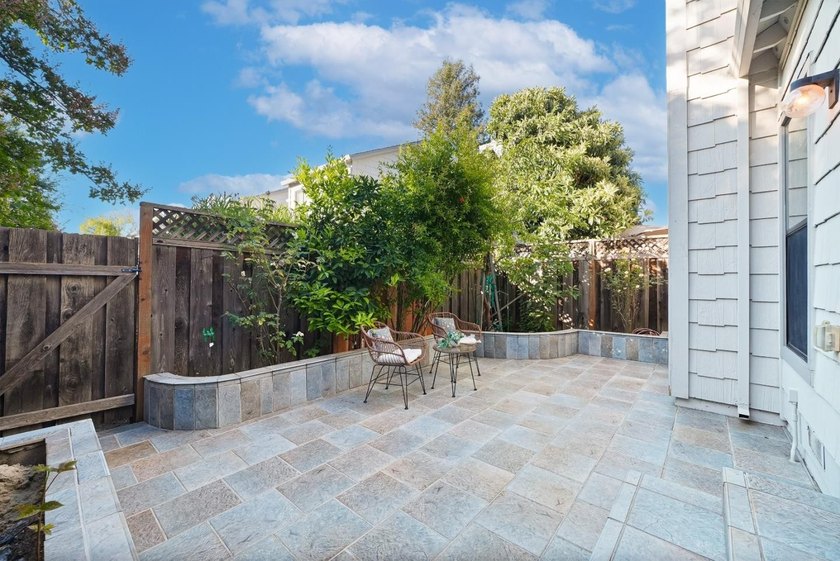*A private, low-maintenance backyard and a spacious primary - photo 5