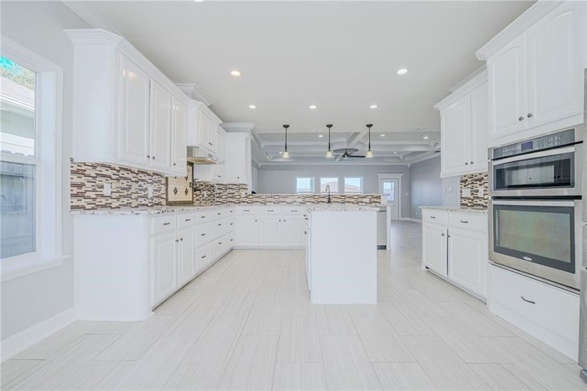 This stylishly crafted home in desirable Sea Oaks Village - photo 11